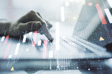 Poster - Multi exposure of abstract financial graph with world map and with hand typing on laptop on background, financial and trading concept
