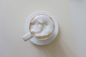 large cup of cappuccino americano coffee overhead shot