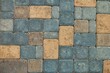 Brick pavers of various colors decorating a walk way.