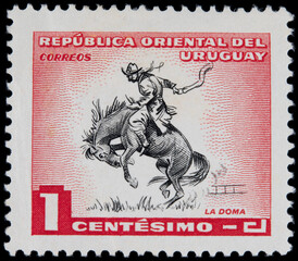 Wall Mural - briefmarke stamp vintage retro alt old rot red cowboy reiter pferd uruguai uruguay rodeo horse