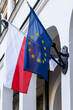 State red and white flag of Poland and blue European Union flag