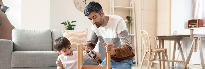 Sticker - Father and little son fixing chair at home. Banner for design