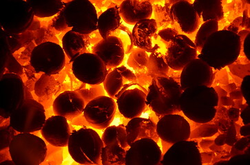 Poster - Burning walnuts as a background.