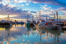  
Fishing Boats In Marina And A Cloudy Sky. This Marina Is Located In The Steveston Area Of Richmond. The Fishing Village Formed In This Place Was The First Settlement On The Territory Of  Richmond 
