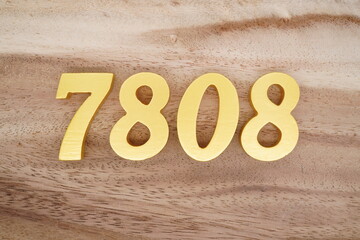 Number 7808 is made of 1 cm thick teak, painted gold on top of real wood with dark brown to light brown patterns to show the dimensions of the picture.