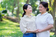 © Timeimage - Portrait of Asian mother and daughter at park