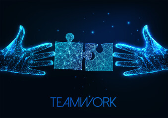 Futuristic teamwork, problem solution concept with glowing two human hands and puzzle pieces 