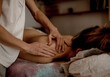 © Halfpoint - Close-up of hands of a masseur massaging back of a young woman, traditional chinese medicine.