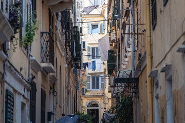 Canvas Print - Narrow alley with residential building in historic part of Corfu city, capital of Corfu Island, Greece