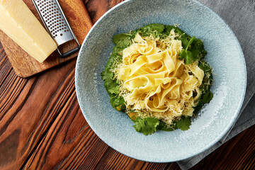 Wall Mural - Fettuccine pasta with pesto sauce.