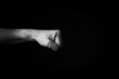 © GrumpyLivesHere - Right Facing Fist emoji isolated on black background