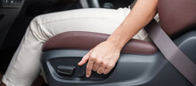 Hand Adjust Car Seat Before Drive On The Road . Ergonomic And Safety Transportation Concept