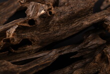 Close UpShot Of Sticks Of Oudh On Black Background The Incense Chips Used By Burning It Or For Arabian Oud Oils Or Bakhoor
