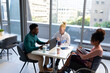 © Wavebreak Media - African american businessman with albino male colleague and mid adult businesswoman on wheelchair