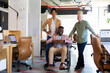 © Wavebreak Media - African american mid adult businesswoman and albino businessman by male colleague on wheelchair