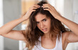Discontented Woman Suffering From Dandruff Looking At Hair Flakes Indoor
