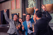 Asian People Group Drinking In Party Congratulation Business Team ,Group Of Friends Enjoying Evening Drinks In Bar