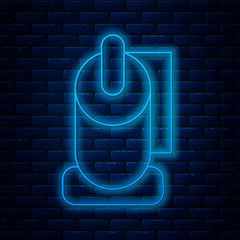 Poster - Glowing neon line Toilet paper roll icon isolated on brick wall background. Vector