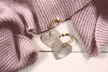 Two Wooden Heart With Warm Knitted Plaid. Scandinavian Style. Beautiful Background For Valentines Day.