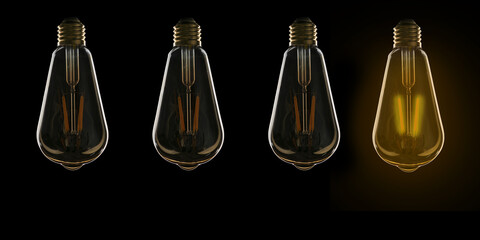 Ideas and innovation concept; Four retro type light bulbs on black background. Three off power. Only one lightened in shiny yellow. A kind of inspiration