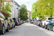 © Maryana - Cars Parking on both Sides of Road. Parking Space Problem. Modern City Life with many Cars Parked on Road in Europe.