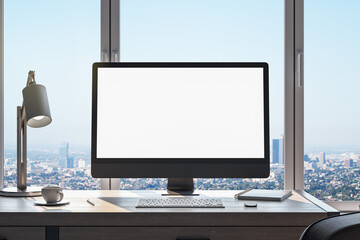 Poster - workplace in office interior with blank mock up computer screen, window with beautiful city view, coffee cup and other items on desktop, pieces of furniture and daylight. 3D Rendering.