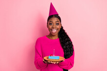 Photo Of Impressed Millennial Brunette Lady Hold Cake Wear Cap Pullover Isolated On Pink Color Background