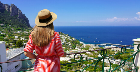 Wall Mural - Panoramic banner of fashion woman in Capri Island enjoying landscape from viewpoint, Southern Italy