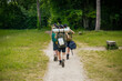 young scouts hiking in the countryside