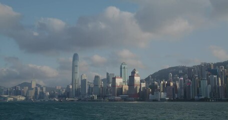 Fototapete - Hong Kong Take ferry cross the Hong Kong Victoria harbor