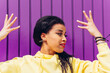 © Dani D.G - Young ethnic woman showing sign