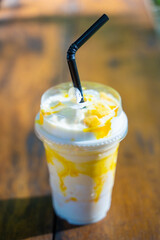 Wall Mural - mango smoothie with yogert in plastic glass