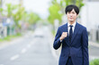 © 茂輝 田代 - 営業のスーツの男性
