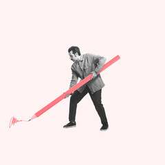 Contemporary art collage.Young man holding huge drawn pencil and writing isolated on light background. Concept of art, creativity, retro style, surrealism