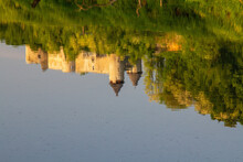 The Reflection Of Novigrad Na Dobri Fortress On The Dobra River, Croatia