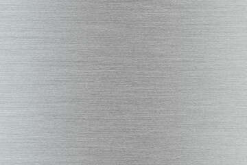 Poster - silver metal texture of brushed stainless steel plate with the reflection of light.