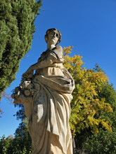 Low-angle Shot Of Pomona Goddess Statue In The Garden