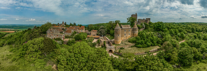 Wall Mural - Aerial view of Brancion castle and medieval village in Burgundy France with square keep, ruined palace building and encircling medieval walls