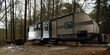Trailer campsite set up in the forest