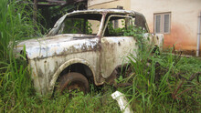 Closeup Shot Of An Abandoned Old Car Outdoors