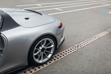 Canvas Print - Rear-wheel of modern coupe car. Expensive convertible car rear part view