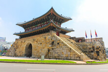 Seoul, South Korea - July 26, 2020 - Paldalmun Gate Is The Southern Gate Of Hwaseong Fortress. The Gate Has An Entrance Wide Enough To Let The King's Palanquin Pass Through. Roundabout Runs Around