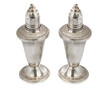 Vintage design of a silver salt and pepper shakers on white background