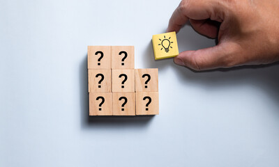 Poster - Top view wooden blocks set to step from question to idea. Concept for creative and design solution.