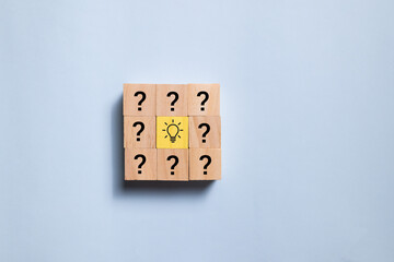 Poster - Top view wooden blocks set to step from question to idea. Concept for creative and design solution.