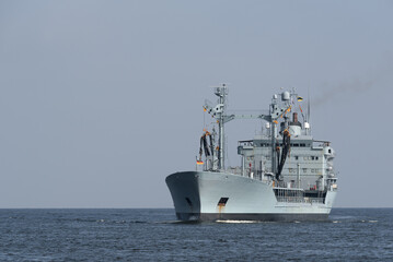 Wall Mural - WARSHIP - A supply ship of the German Navy is sailing on the sea
