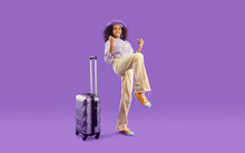 YES, Finally. Kid With Suitcase Very Excited About Going On Vacation. Full Body Length Happy Cute Tourist Girl Having Fun In Studio With Purple Background. Traveling, Holidays, Children Concept