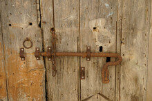 Rusty Old Door Lock And Old Wooden Door
