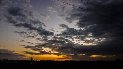 Wall Mural - Silhouette of cityscaper buildings during a sunset in Brazil