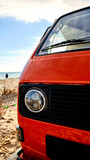 Fototapeta Łazienka - Red van by the sea